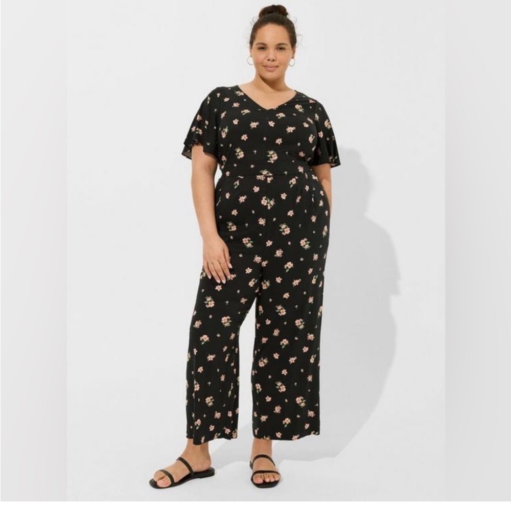 Torrid Black Jumpsuit with Floral Pattern